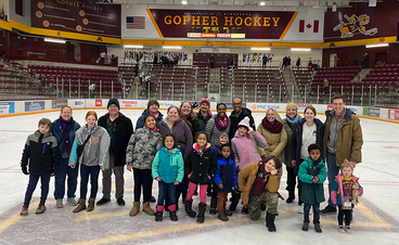 Families associated with ISPC on the ice at Mariucci Arena